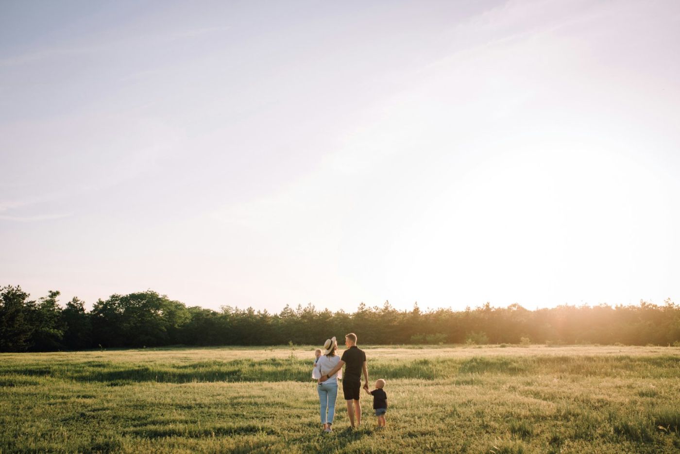 Las Vegas family and their dog on the lawn of a VA-financed home in Summerlin